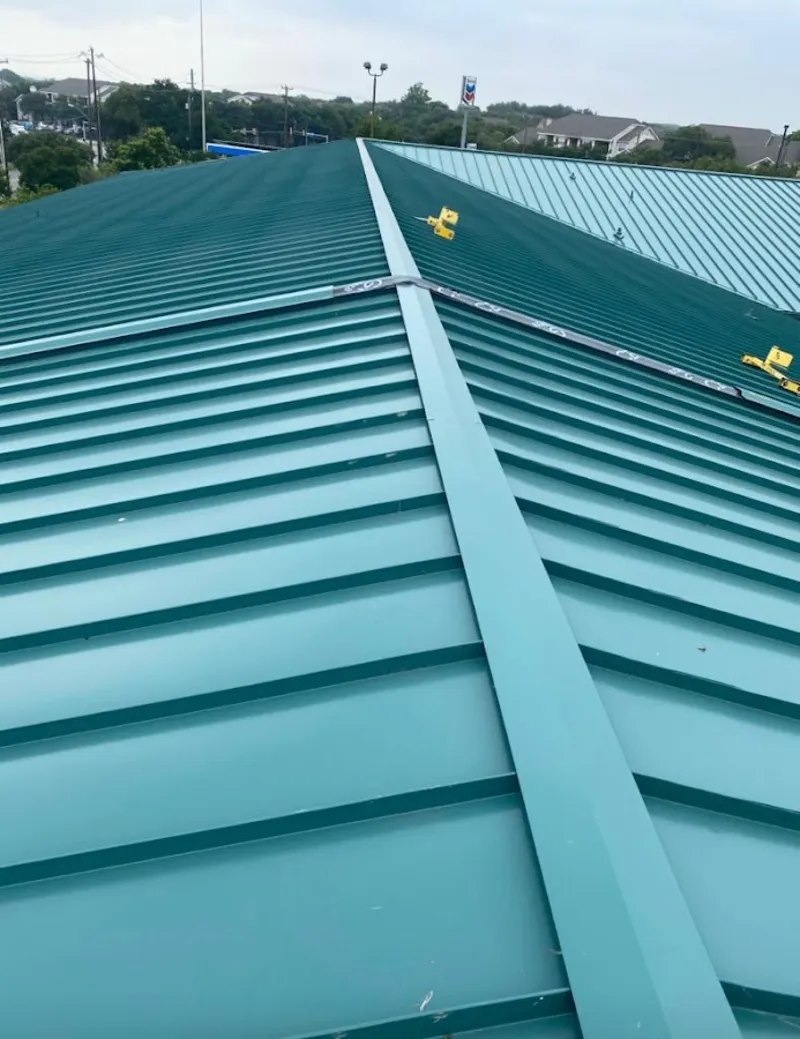 Green commercial metal roof ridge and valley for Metal Roof Repair in Blair