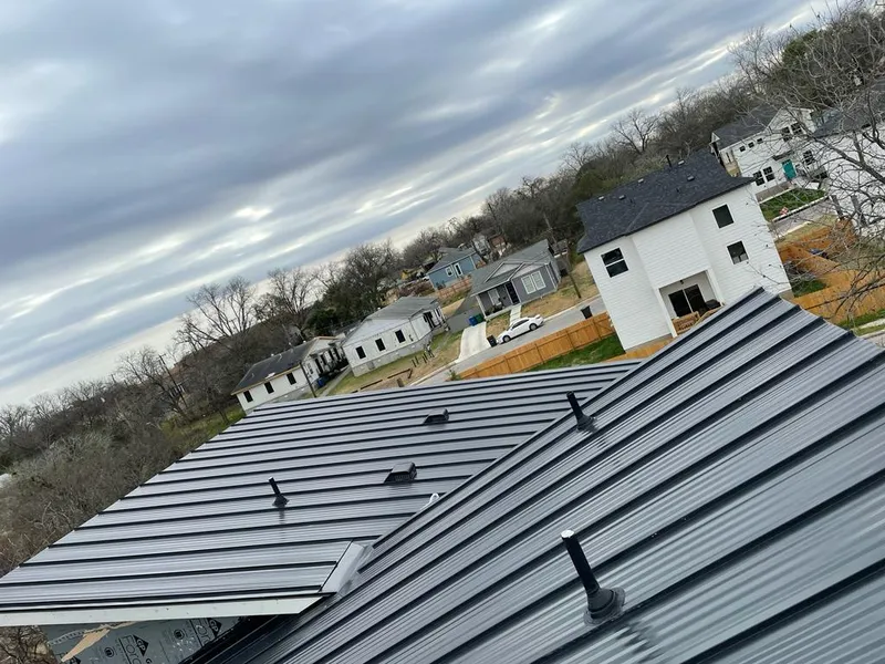 Standing seam metal roof panels with vents for Skylight Repair in Blair